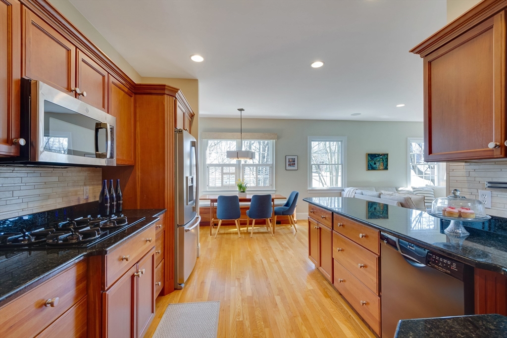 29 Old Bridge Road Concord, MA 01742 - Photo 6 of 40 a kitchen with lots of counter top space a sink and appliances
