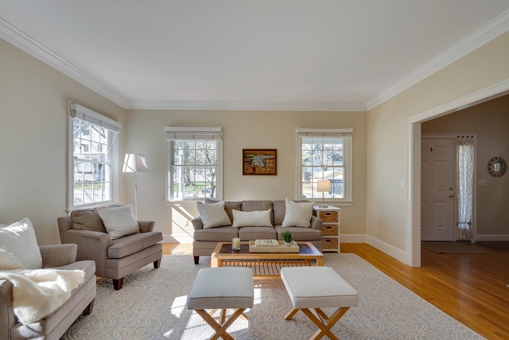 29 Old Bridge Road Concord, MA 01742 - Photo 7 of 40 a living room with furniture wooden floor and window