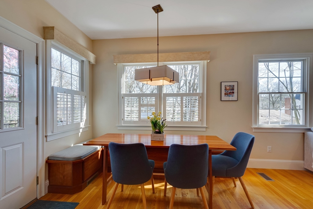 29 Old Bridge Road Concord, MA 01742 - Photo 8 of 40 a view of a dining room with furniture wooden floor and chandelier