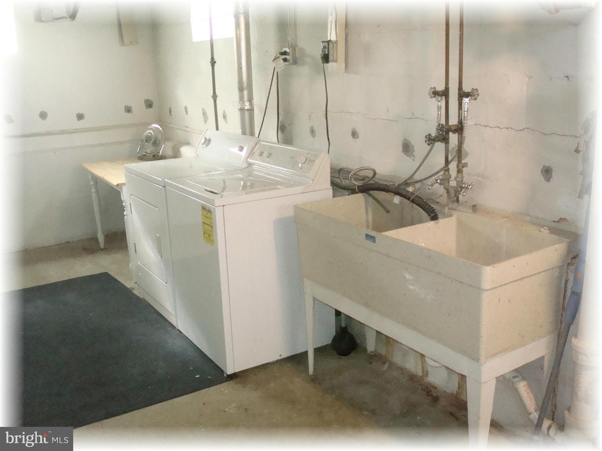 372 Stillwater Road Baltimore, MD 21221 - Photo 28 of 29 Washer & dryer convey.