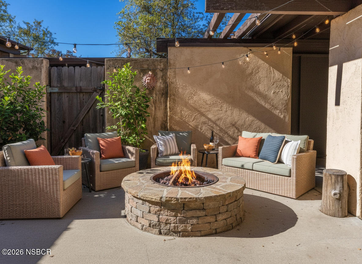 639 Roskilde Road Solvang, CA 93463 - Photo 20 of 27 a outdoor living space with furniture and a fireplace