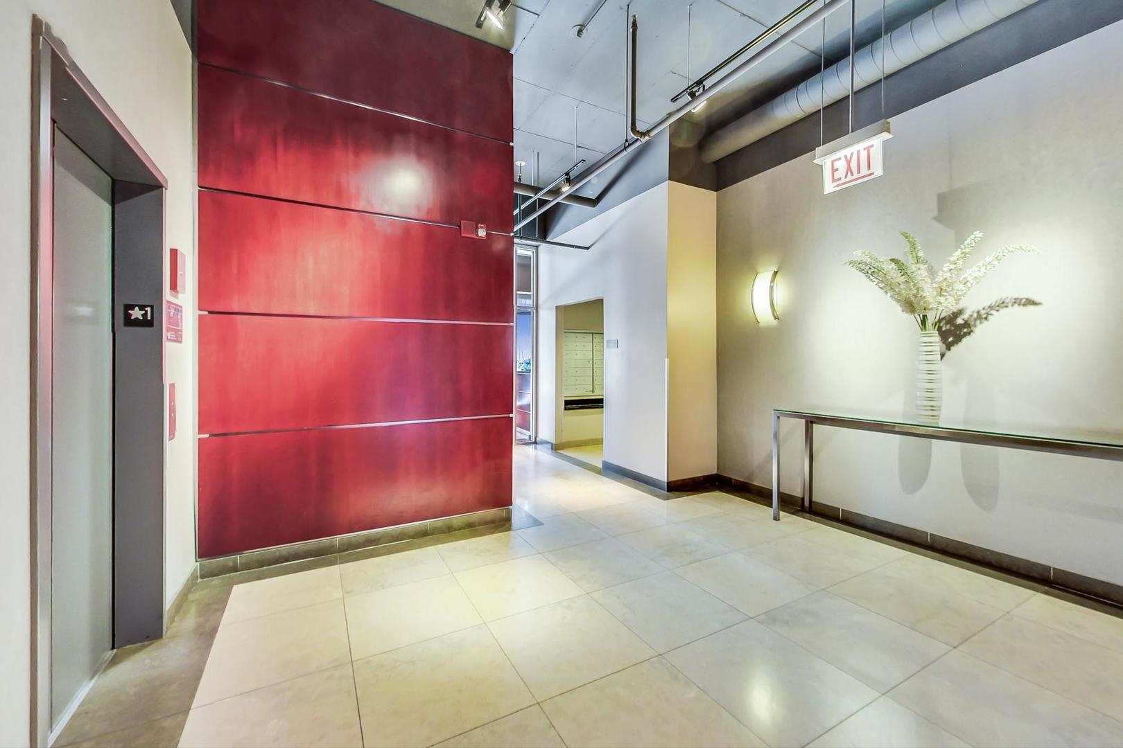 740 West Fulton Street, Unit 905 Chicago, IL 60661 - Photo 18 of 23 a view of a indoor garage