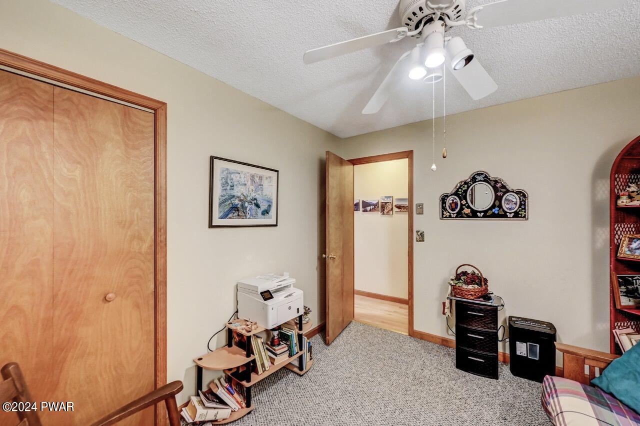 141 Maple Ridge Drive Hawley, PA 18428 - Photo 58 of 84 a view of a room with gym equipment