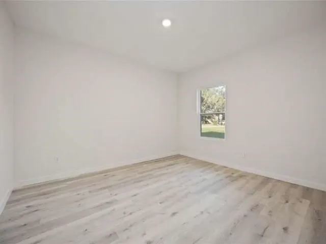 an empty room with a window