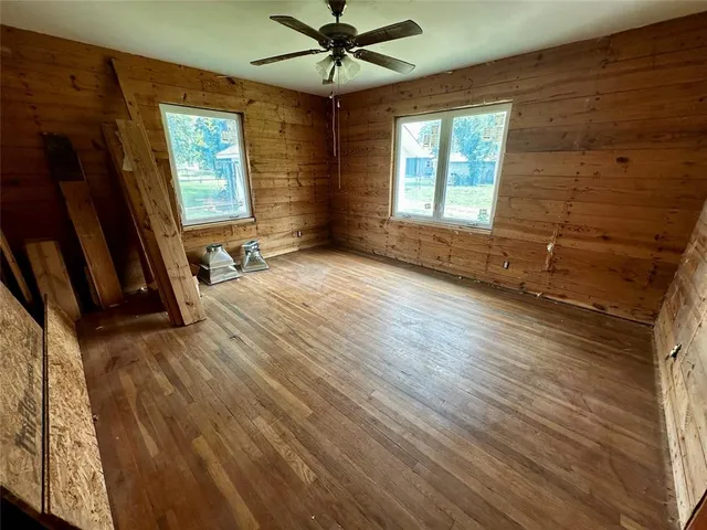 an empty room with windows