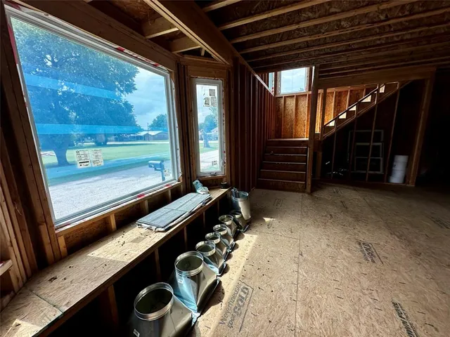 a view of sitting area in front of house