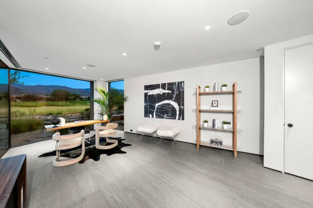 a room with furniture and a wooden floor