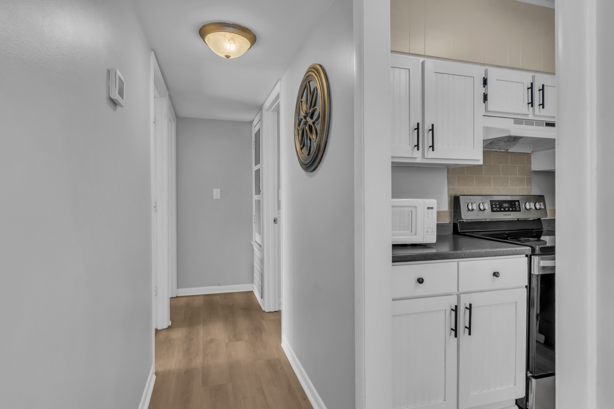 1900 Richard Jones Road, Unit R8 Nashville, TN 37215 - Photo 11 of 21 a view of kitchen with stainless steel appliances granite countertop a refrigerator and a stove top oven
