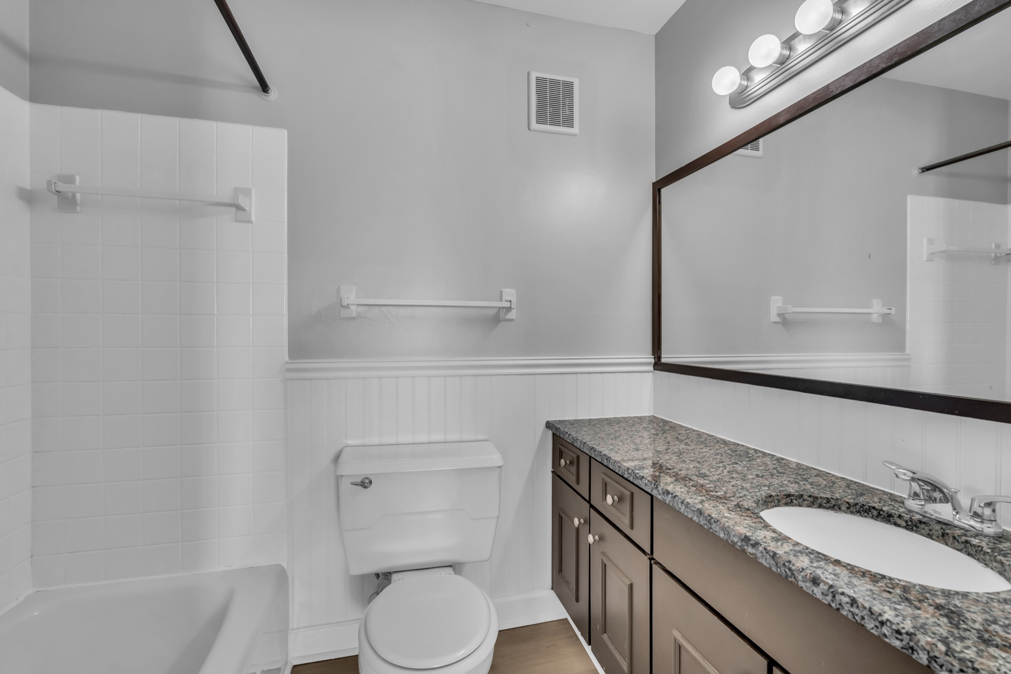 1900 Richard Jones Road, Unit R8 Nashville, TN 37215 - Photo 14 of 21 a bathroom with a granite countertop sink a toilet and bathtub