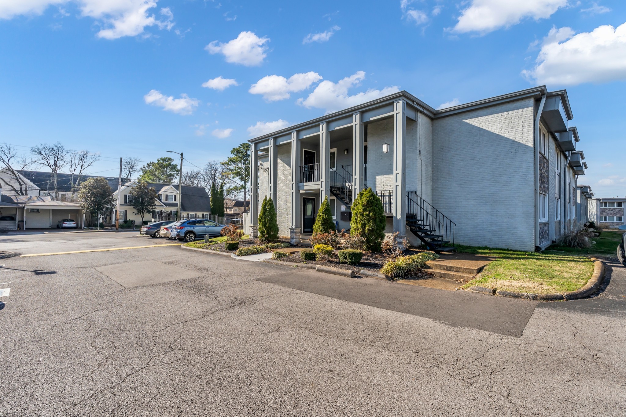 1900 Richard Jones Road, Unit R8 Nashville, TN 37215 - Photo 18 of 21 a view of a house with outdoor space and porch