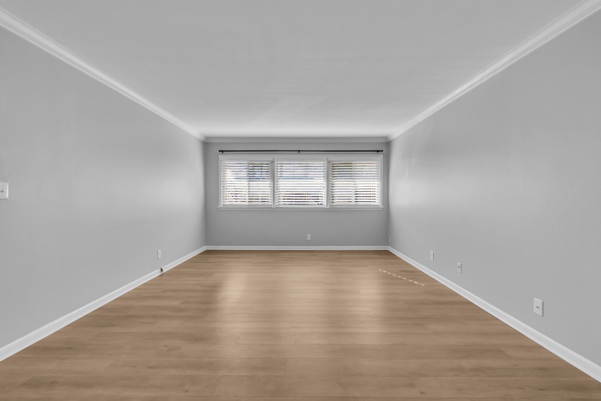 1900 Richard Jones Road, Unit R8 Nashville, TN 37215 - Photo 6 of 21 an empty room with wooden floor and windows