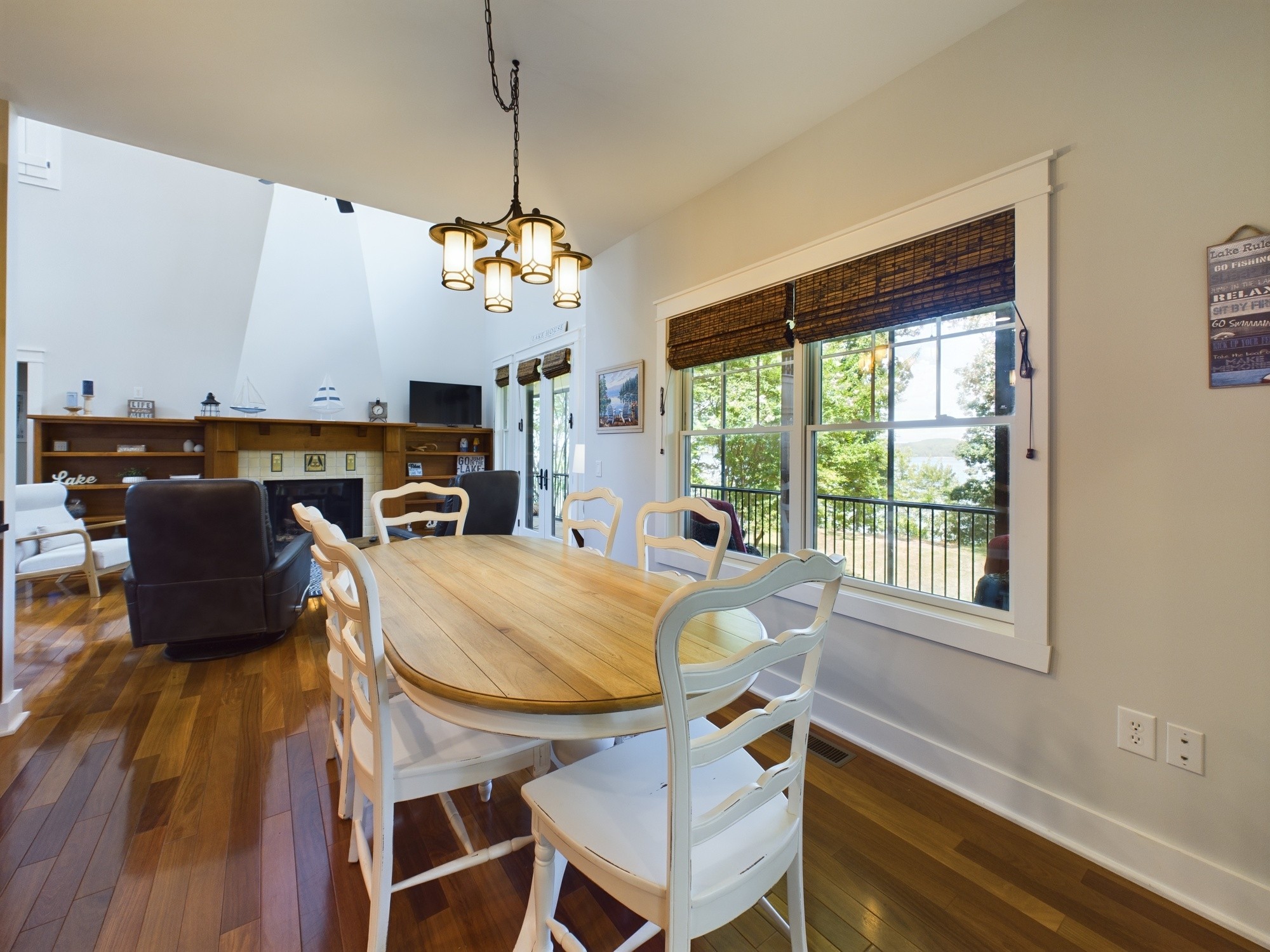 240 Weekend Lane Murray, KY 42071 - Photo 17 of 65 a view of a dining room with furniture window and wooden floor