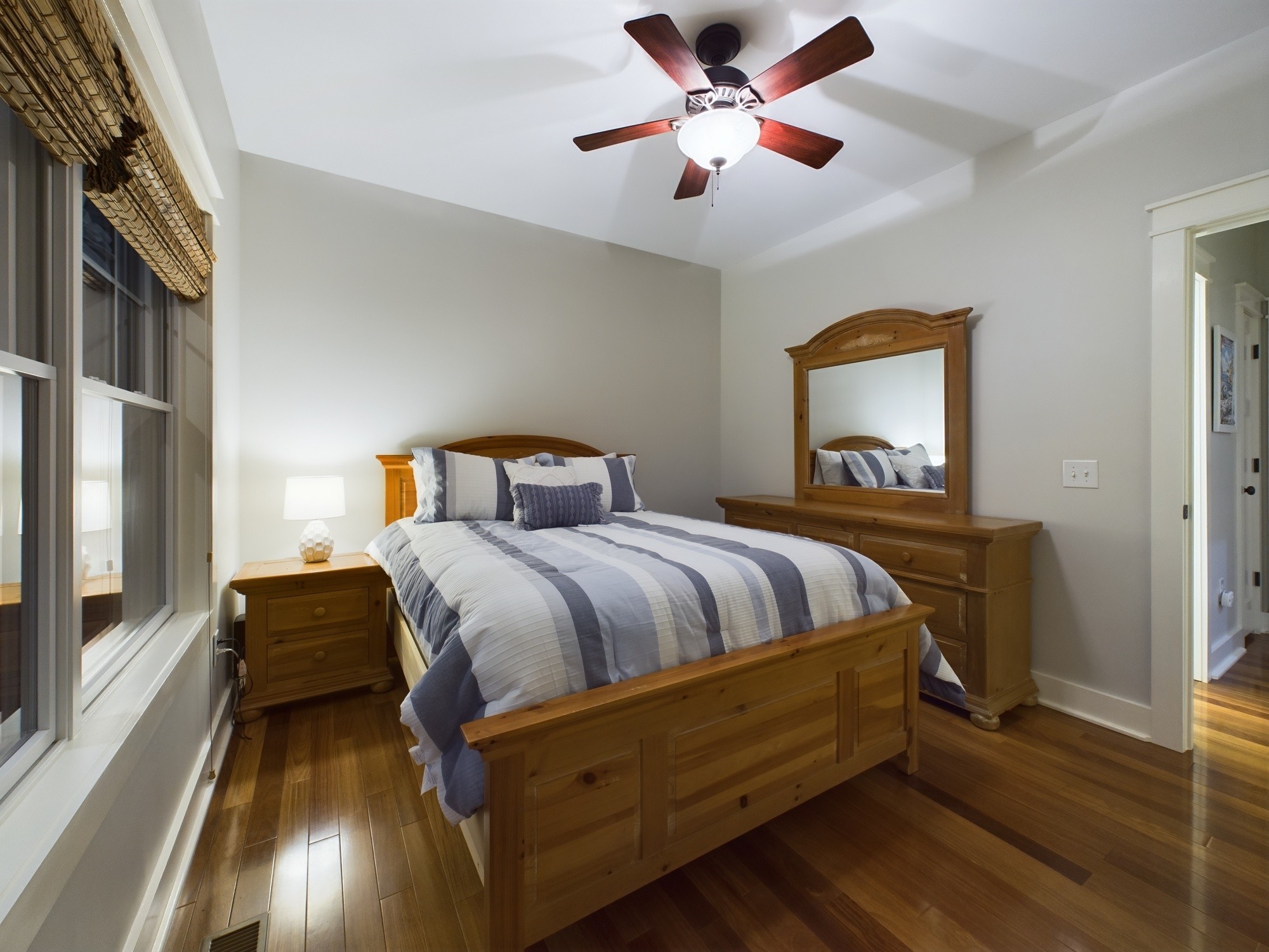 240 Weekend Lane Murray, KY 42071 - Photo 20 of 65 a bedroom with a bed and a chandelier