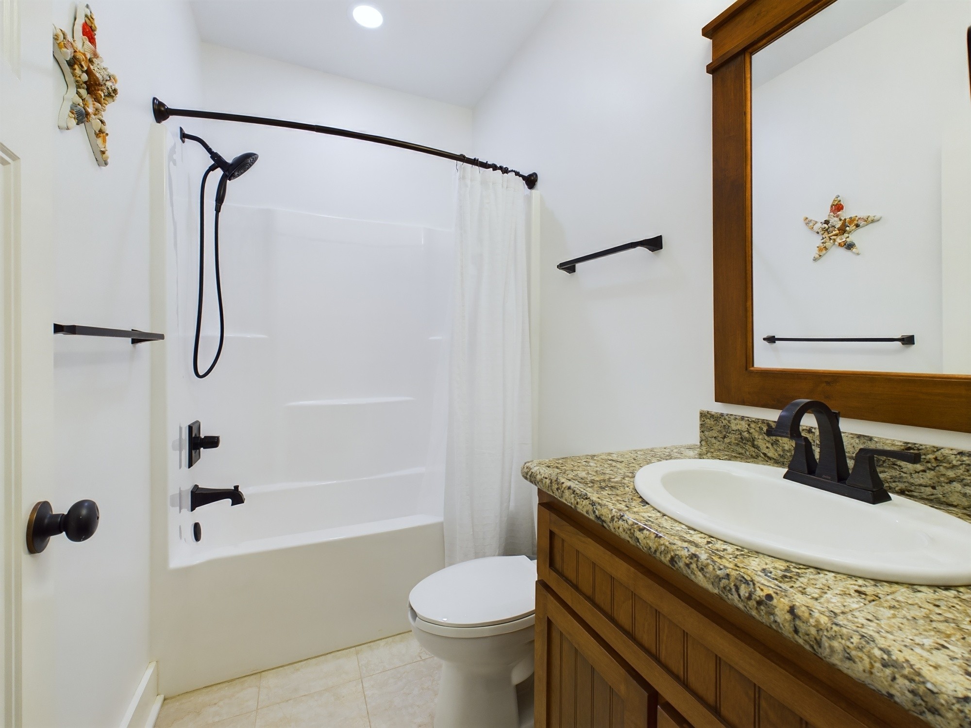 240 Weekend Lane Murray, KY 42071 - Photo 21 of 65 a bathroom with a granite countertop sink toilet and shower