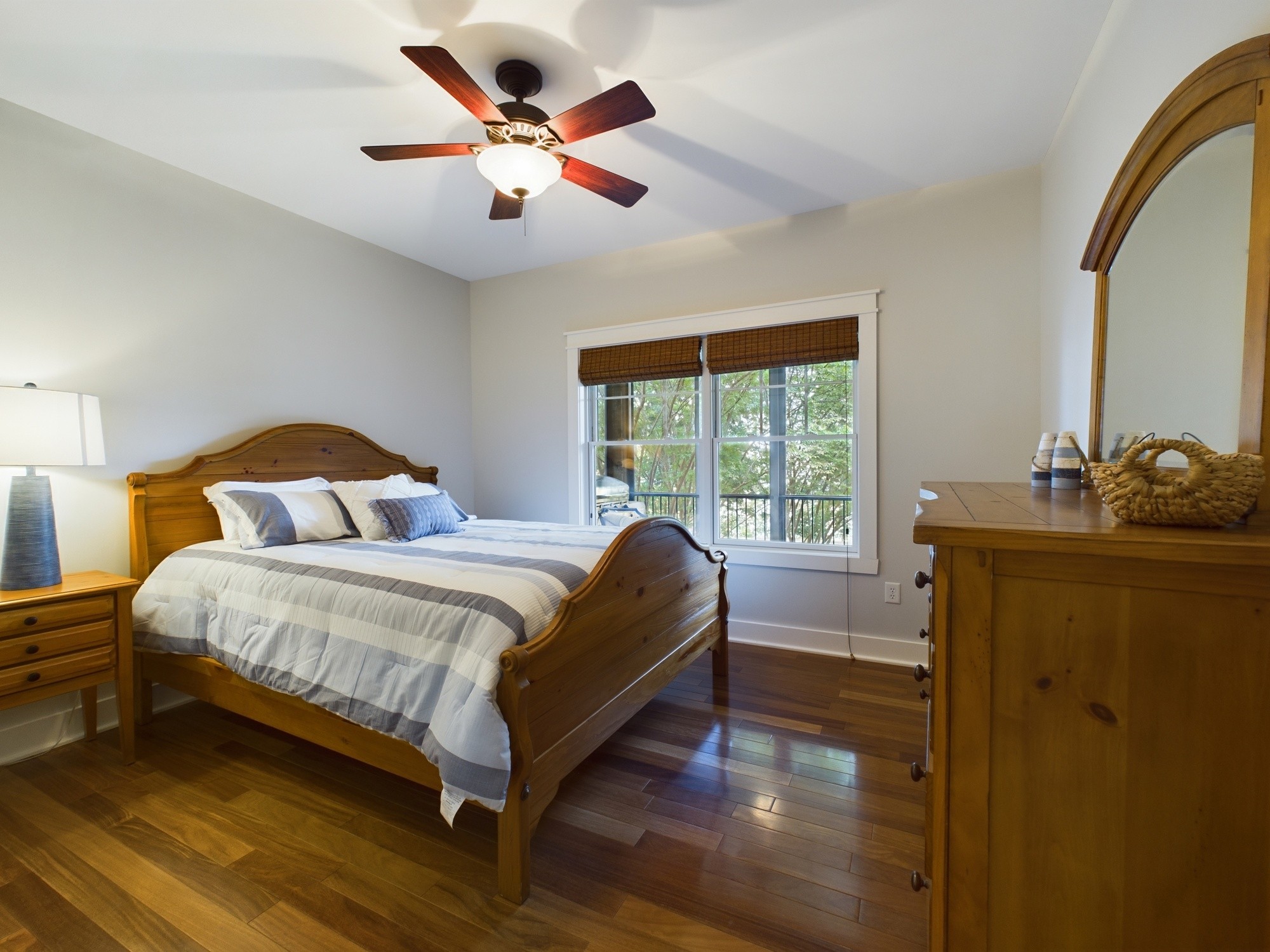 240 Weekend Lane Murray, KY 42071 - Photo 22 of 65 a bedroom with a bed and a large window