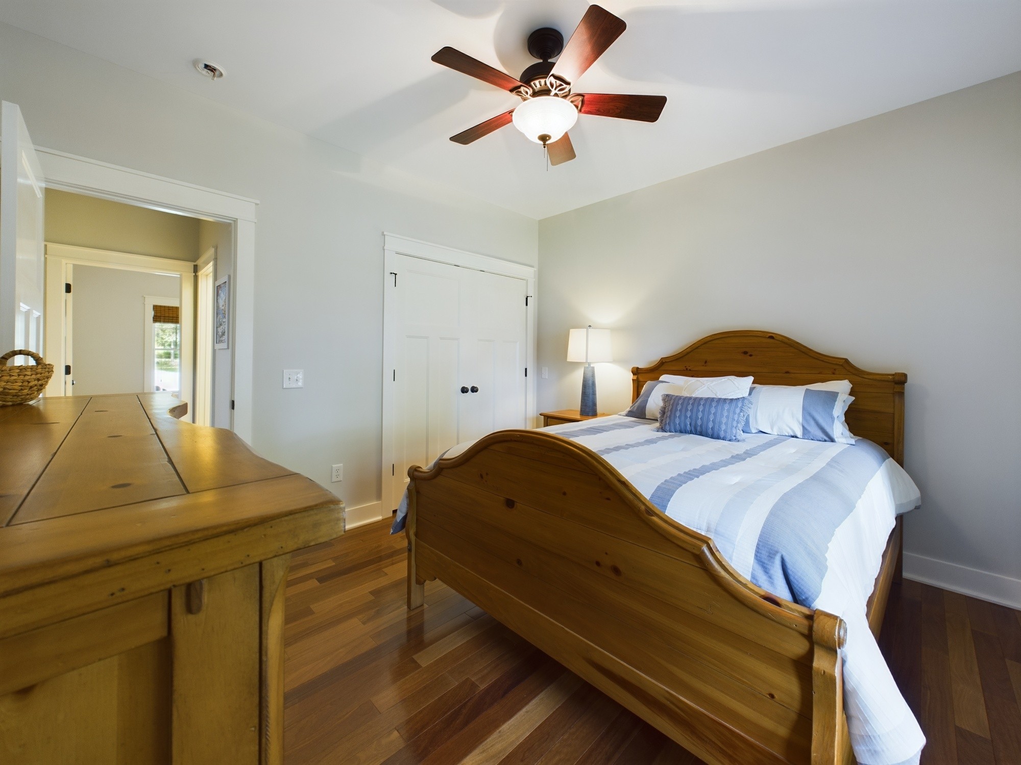 240 Weekend Lane Murray, KY 42071 - Photo 23 of 65 a bedroom with a bed and a chandelier