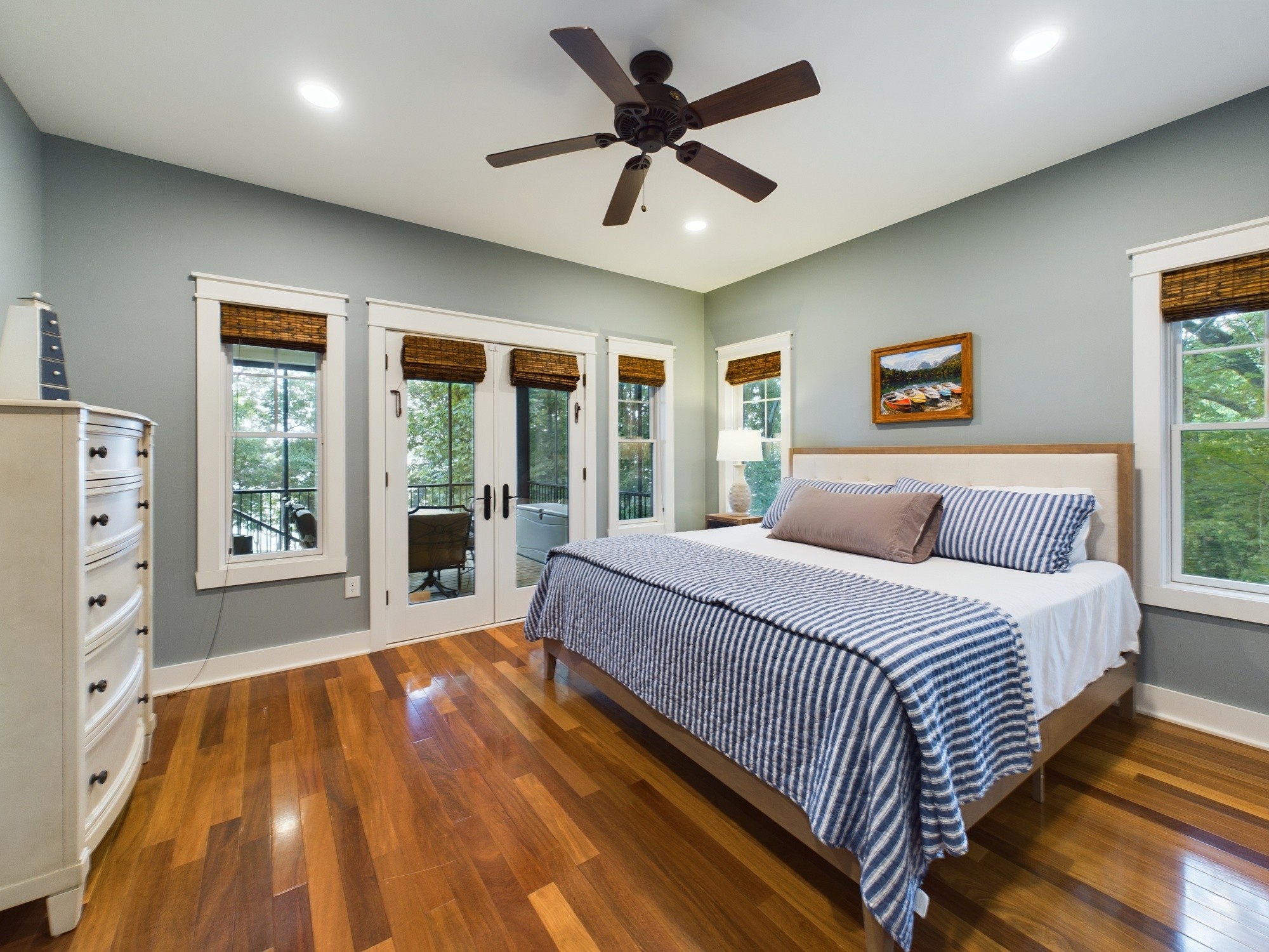 240 Weekend Lane Murray, KY 42071 - Photo 33 of 65 a spacious bedroom with a large bed and a large window