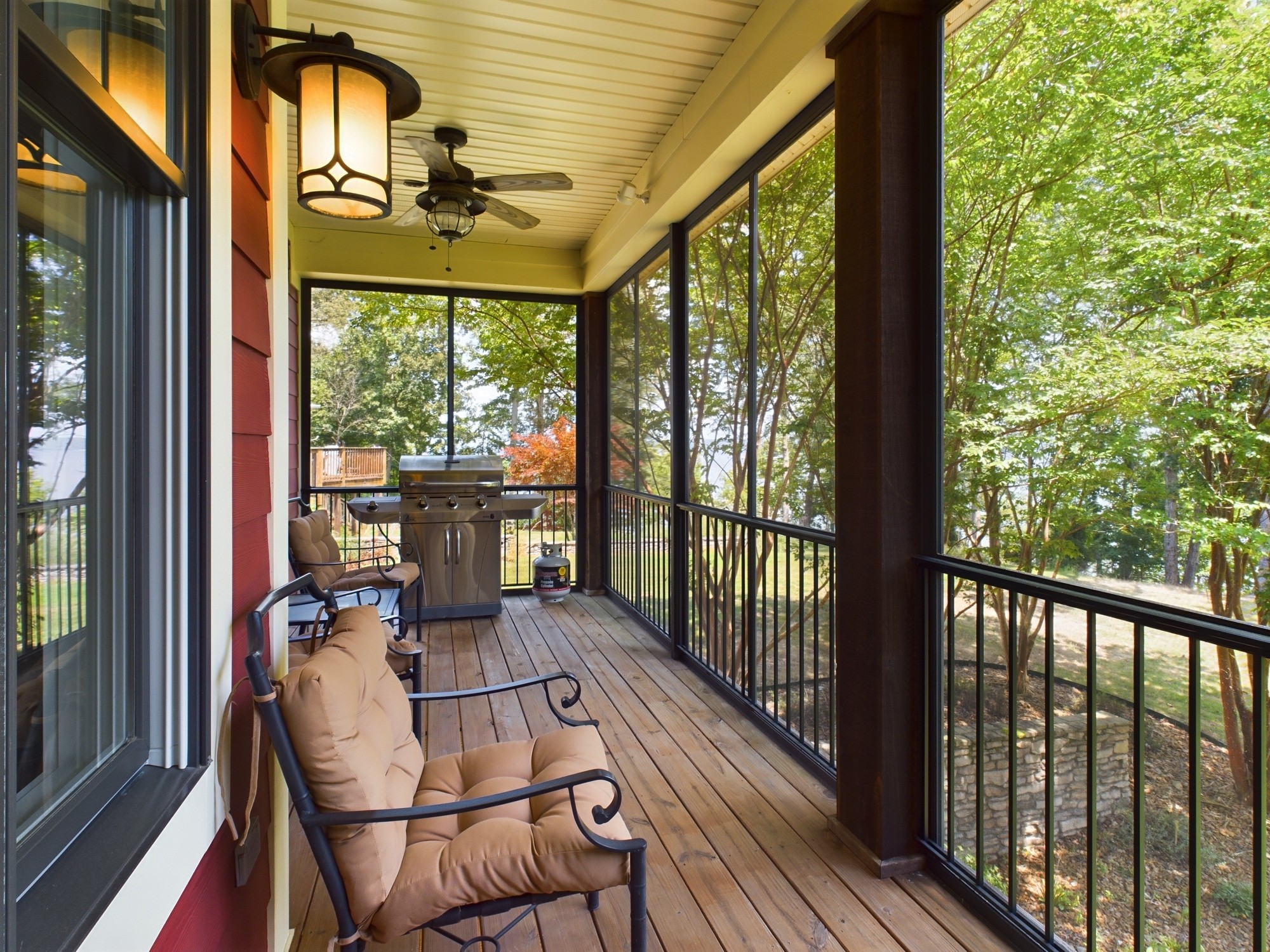 240 Weekend Lane Murray, KY 42071 - Photo 37 of 65 a view of a balcony with furniture and wooden floor