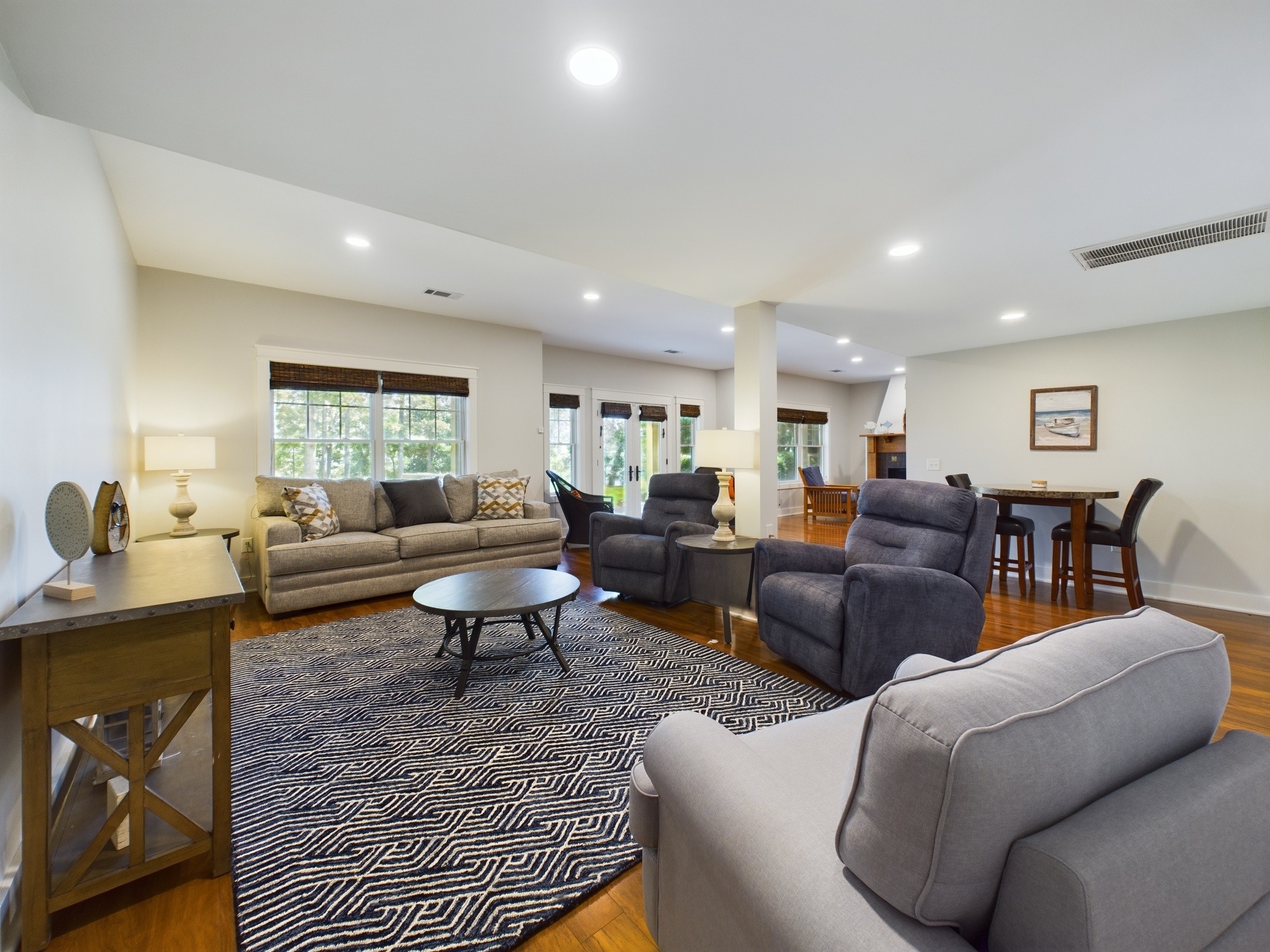 240 Weekend Lane Murray, KY 42071 - Photo 45 of 65 a living room with furniture a large window and a table