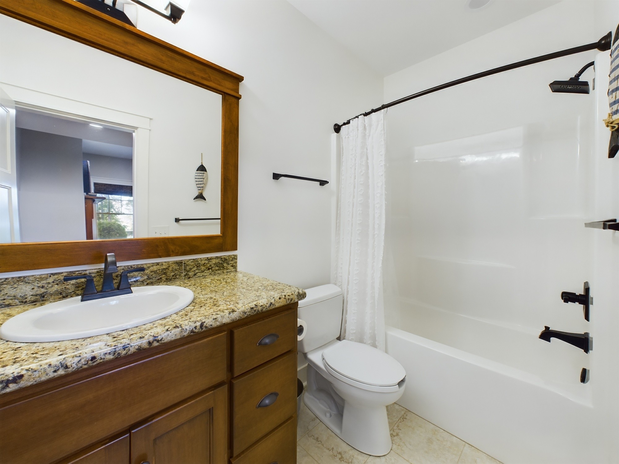 240 Weekend Lane Murray, KY 42071 - Photo 49 of 65 a bathroom with a granite countertop sink toilet and shower