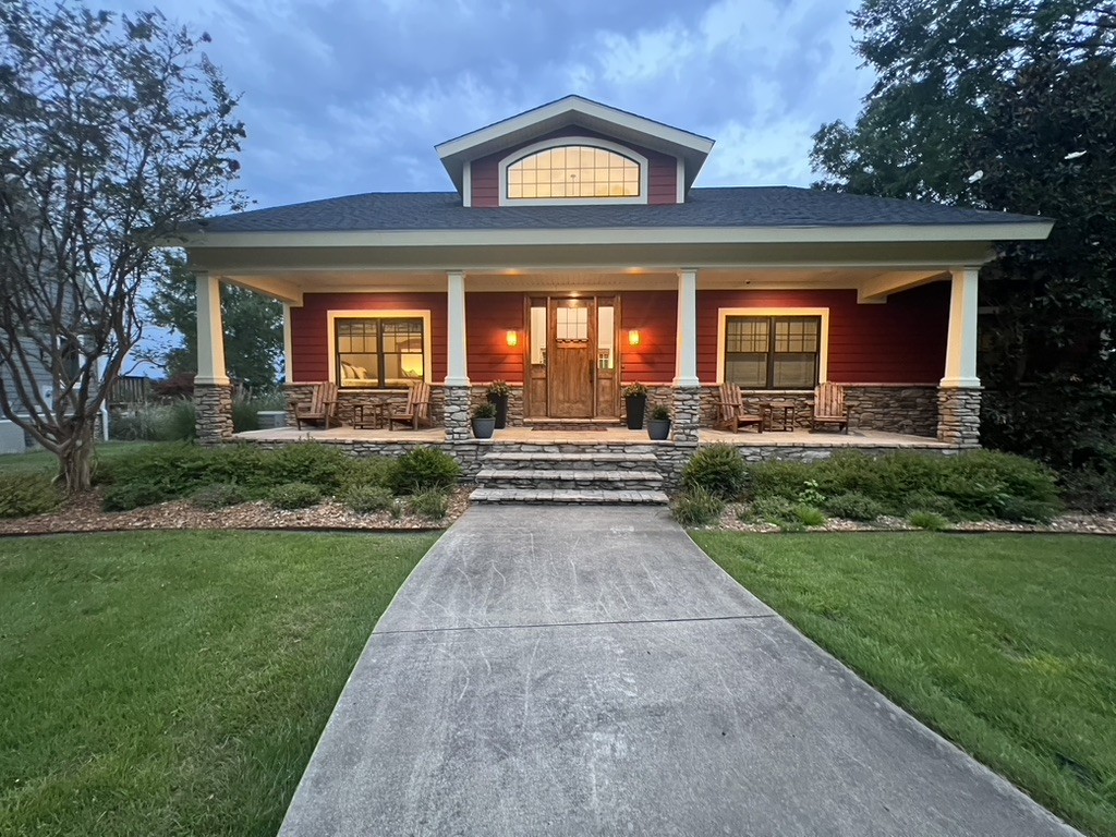 240 Weekend Lane Murray, KY 42071 - Photo 5 of 65 a front view of a house with a yard