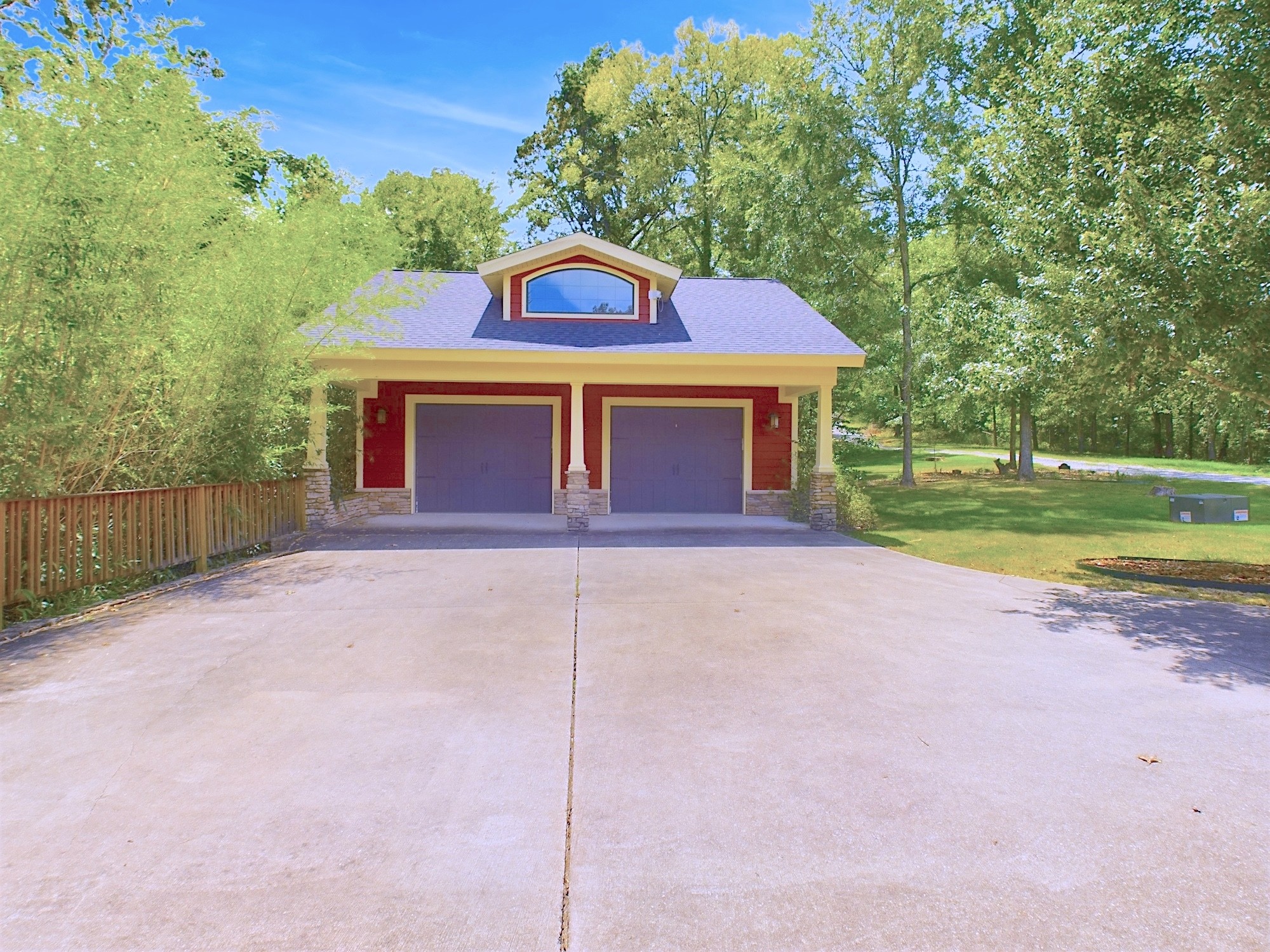 240 Weekend Lane Murray, KY 42071 - Photo 7 of 65 a front view of a house with a yard