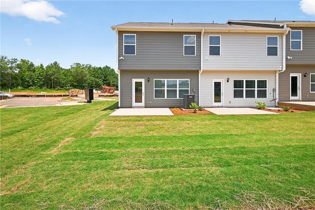 front view of a building with a yard