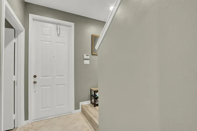 a view of a hallway with closet