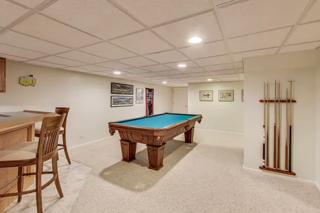 a room with furniture and a rug