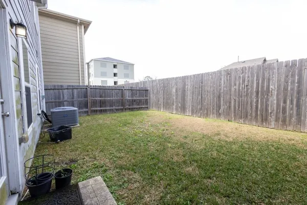 a view of a backyard with a garden