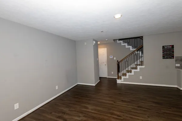 a view of entryway with wooden floor