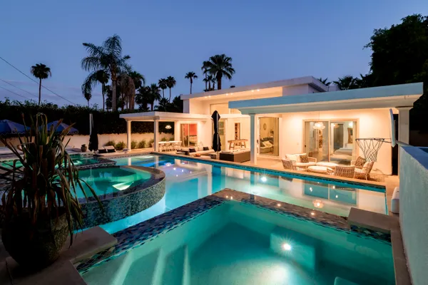 an outdoor view of a swimming pool