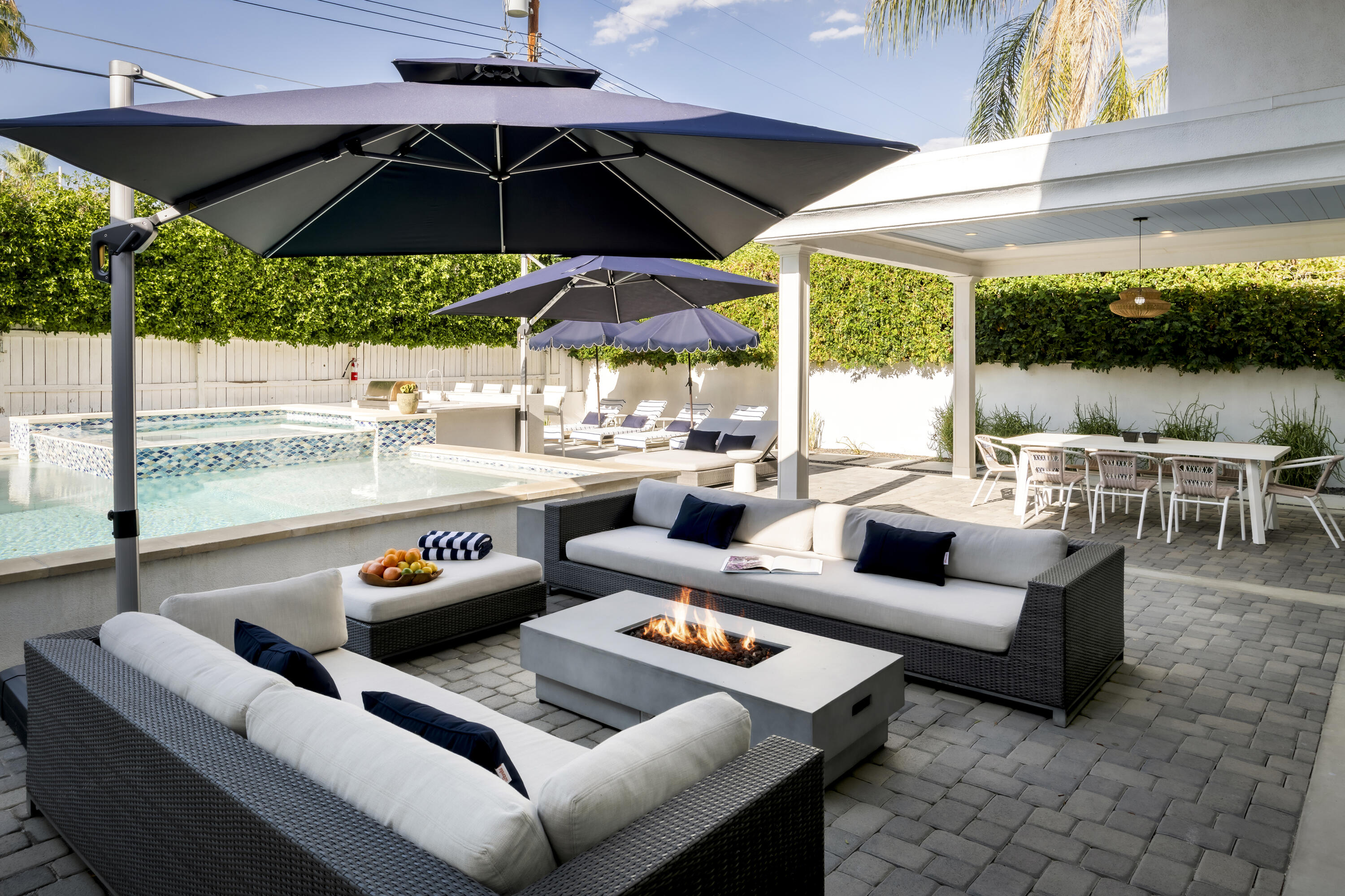 154 Ocotillo Avenue Palm Springs, CA 92264 - Photo 11 of 25 a outdoor space with patio the couches and pool