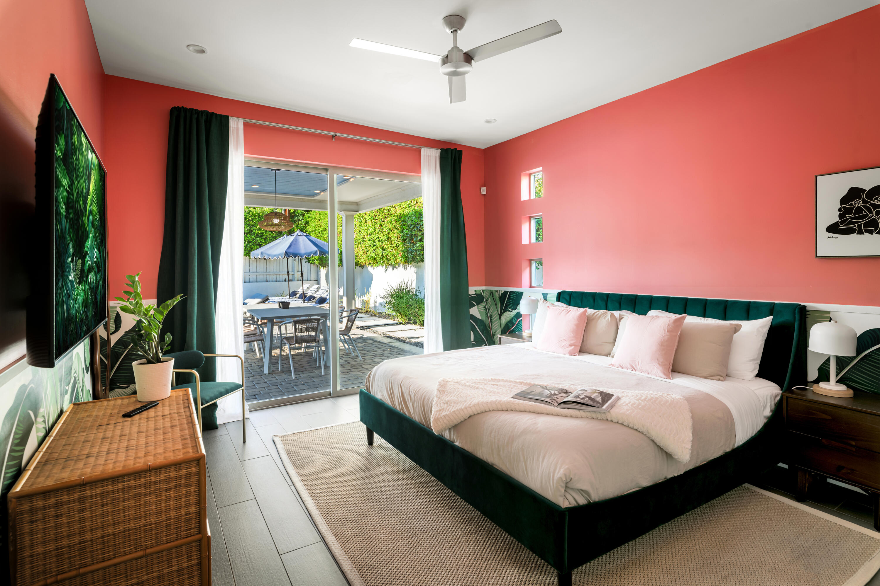 154 Ocotillo Avenue Palm Springs, CA 92264 - Photo 12 of 25 a bedroom with a large bed and a large window
