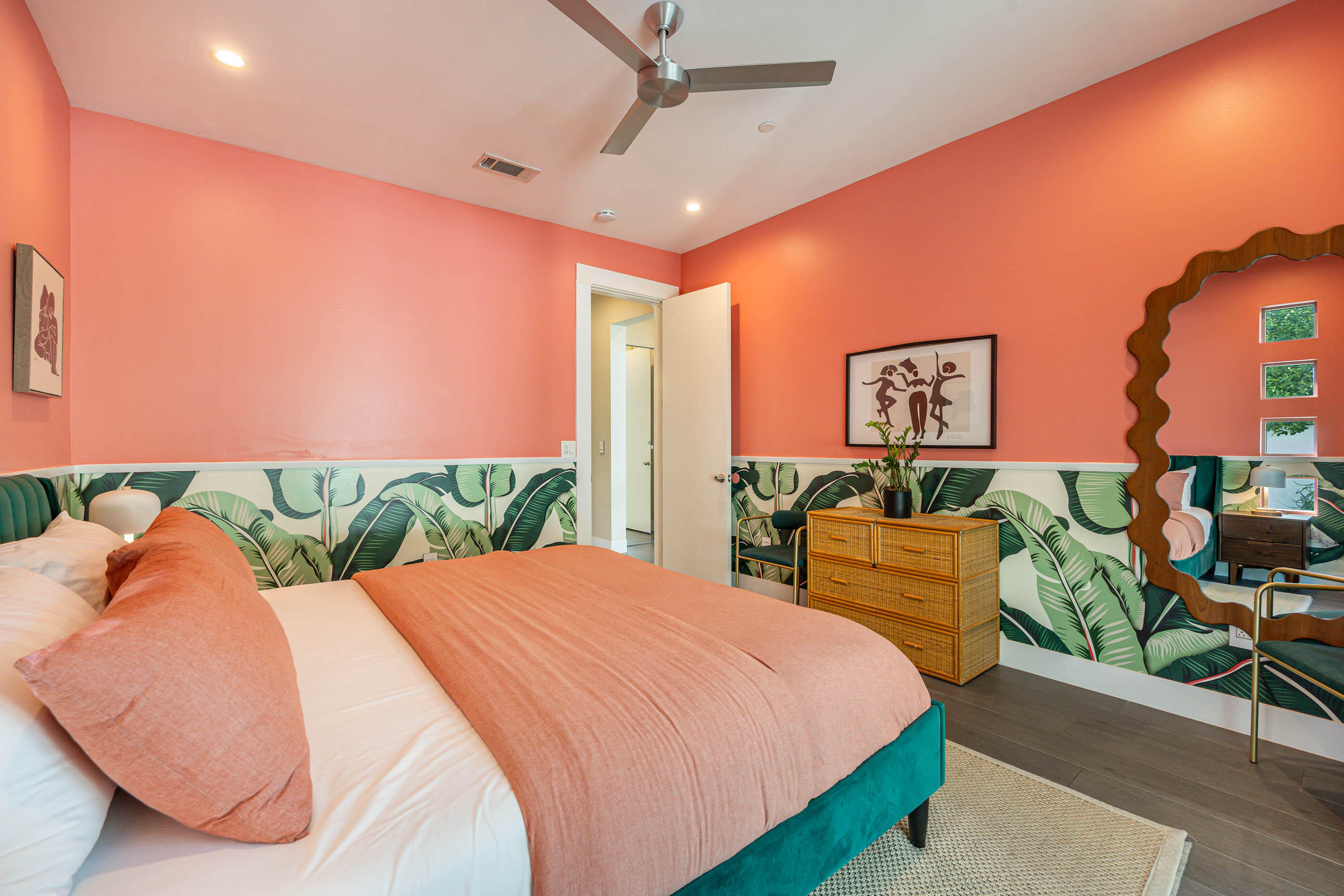 154 Ocotillo Avenue Palm Springs, CA 92264 - Photo 13 of 25 a bed room with a bed and a painting on the wall