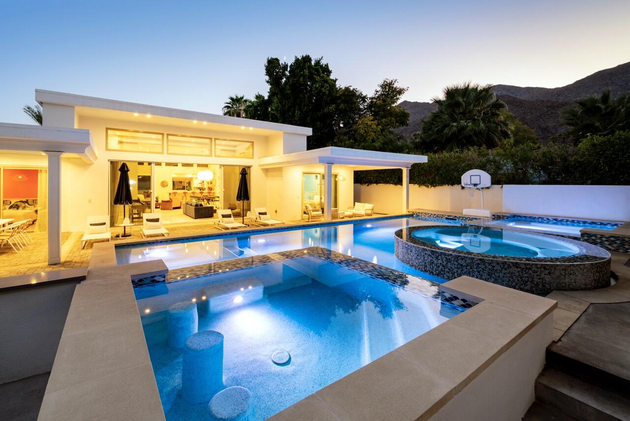 154 Ocotillo Avenue Palm Springs, CA 92264 - Photo 23 of 25 a view of a swimming pool with seating area