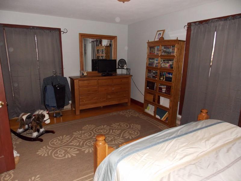 1612 Stonewall Road Northeast Check, VA 24072 - Photo 18 of 43 a bedroom with a bed and a television