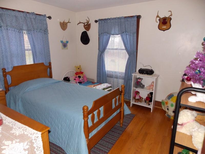 1612 Stonewall Road Northeast Check, VA 24072 - Photo 23 of 43 a bedroom with bed and a window
