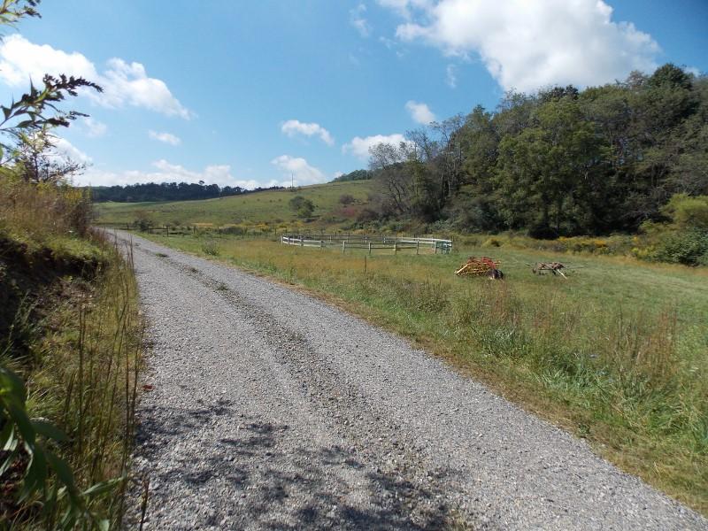 1612 Stonewall Road Northeast Check, VA 24072 - Photo 25 of 43 a view of a lake with a beach