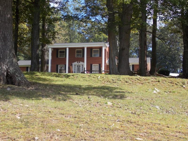 1612 Stonewall Road Northeast Check, VA 24072 - Photo 42 of 43 a view of a house with a yard