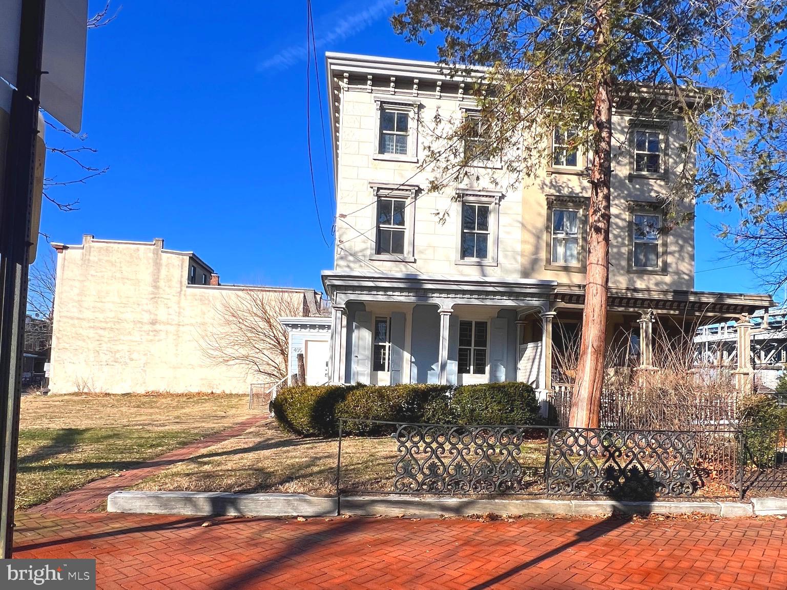 405 North 2nd Street Camden, NJ 08102 - Photo 1 of 15 a view of a building with a yard