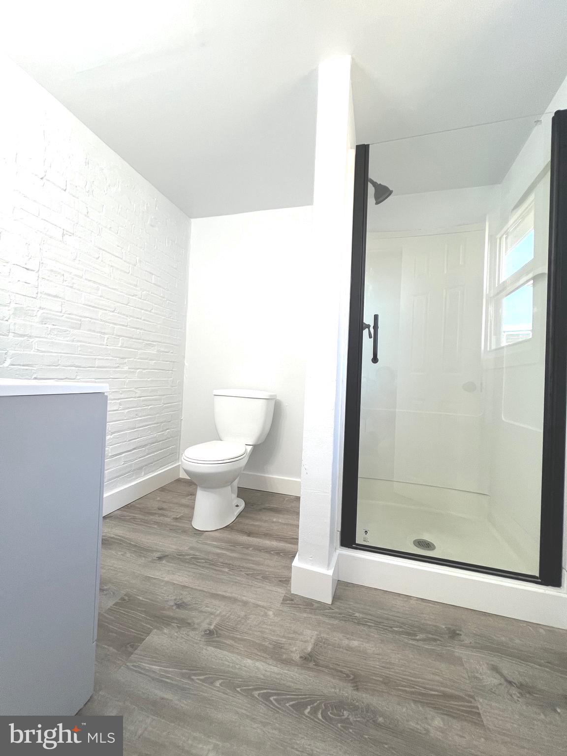 405 North 2nd Street Camden, NJ 08102 - Photo 8 of 15 a bathroom with a toilet and a shower