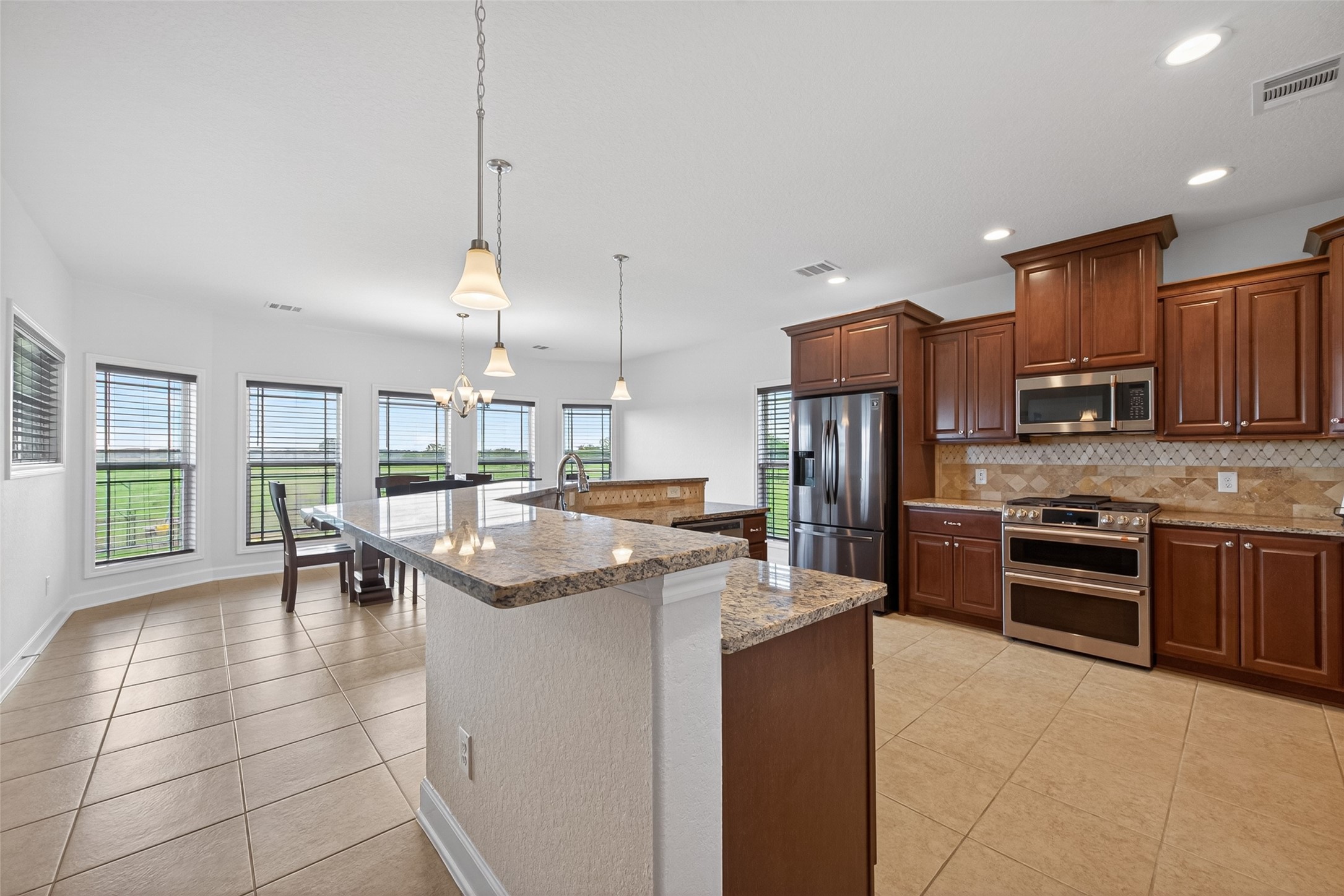 13506 Moody Road Needville, TX 77461 - Photo 10 of 36 Kitchen with granite counters & soft close cabinets and drawers