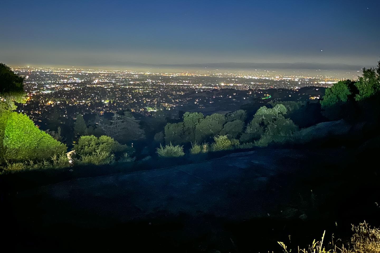 16227 Maya Way Los Gatos, CA 95030 - Photo 16 of 27 a view of a city street from a yard