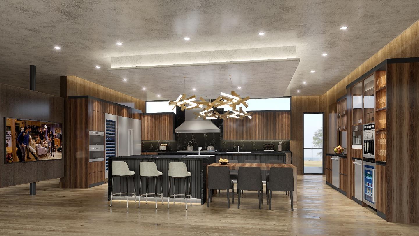 16227 Maya Way Los Gatos, CA 95030 - Photo 3 of 27 a kitchen with stainless steel appliances kitchen island granite countertop a table and chairs in it