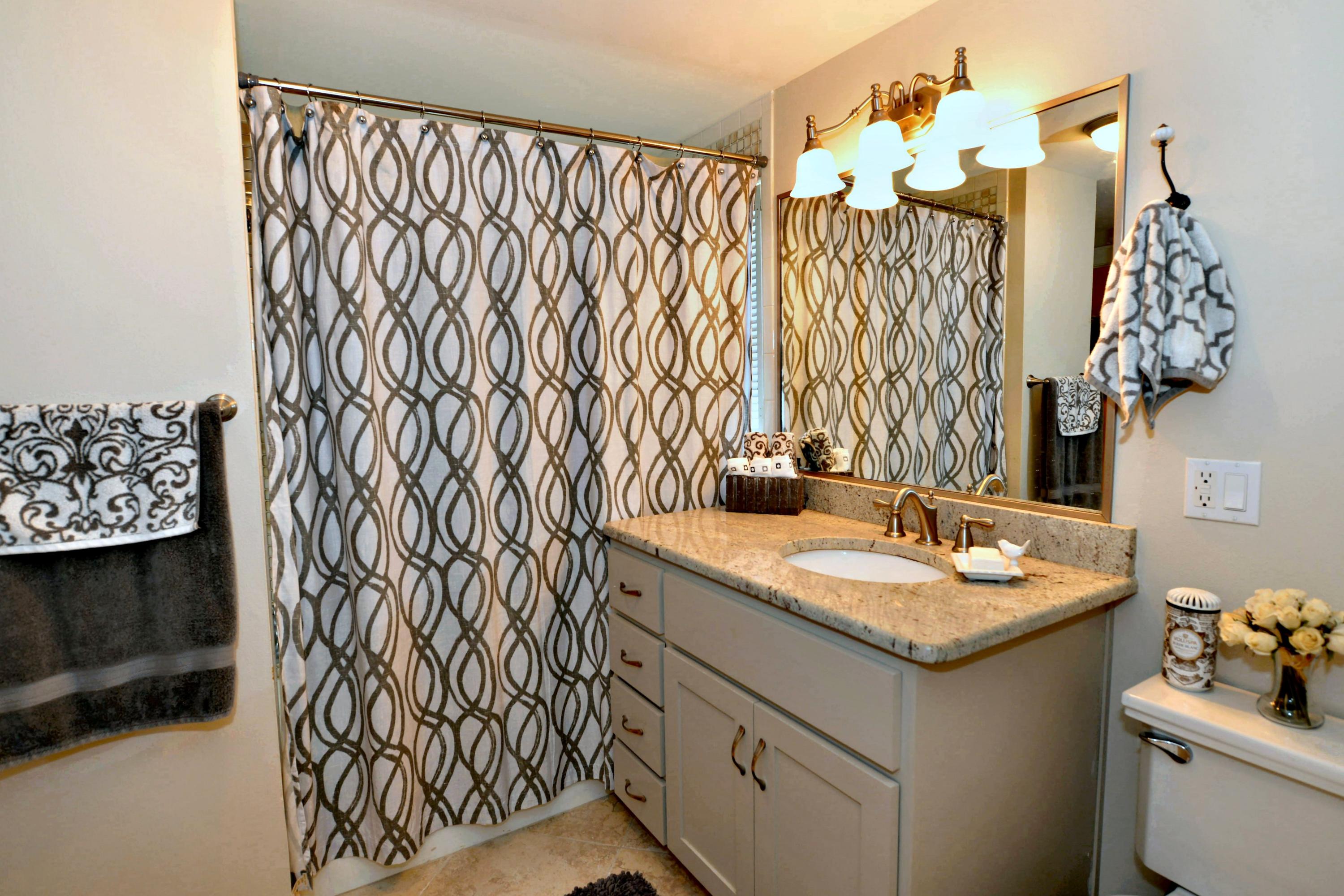 2394 Bay Grove Road Freeport, FL 32439 - Photo 20 of 37 a bathroom with a sink and a mirror