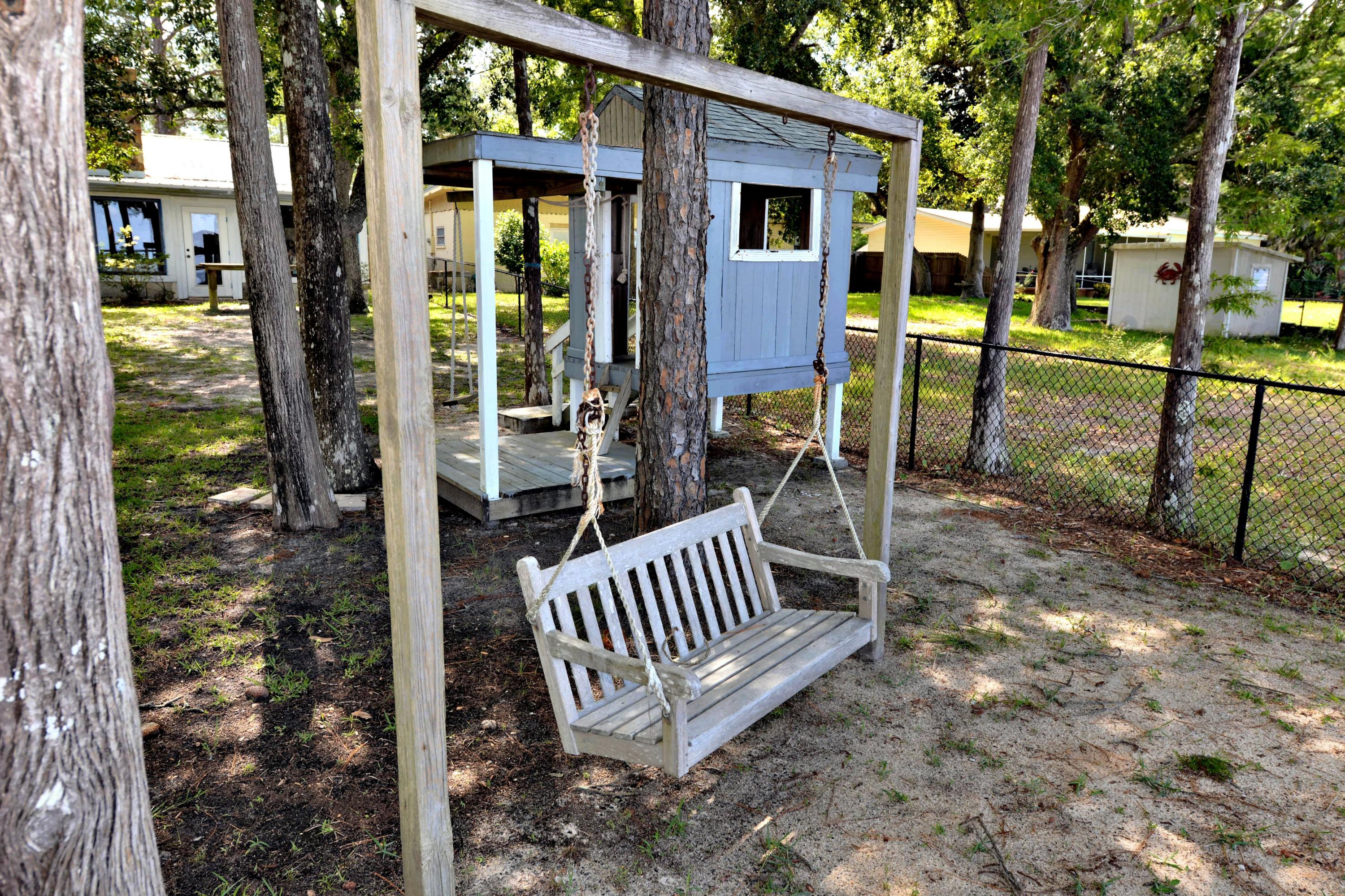 2394 Bay Grove Road Freeport, FL 32439 - Photo 30 of 37 a view of backyard with deck and outdoor seating