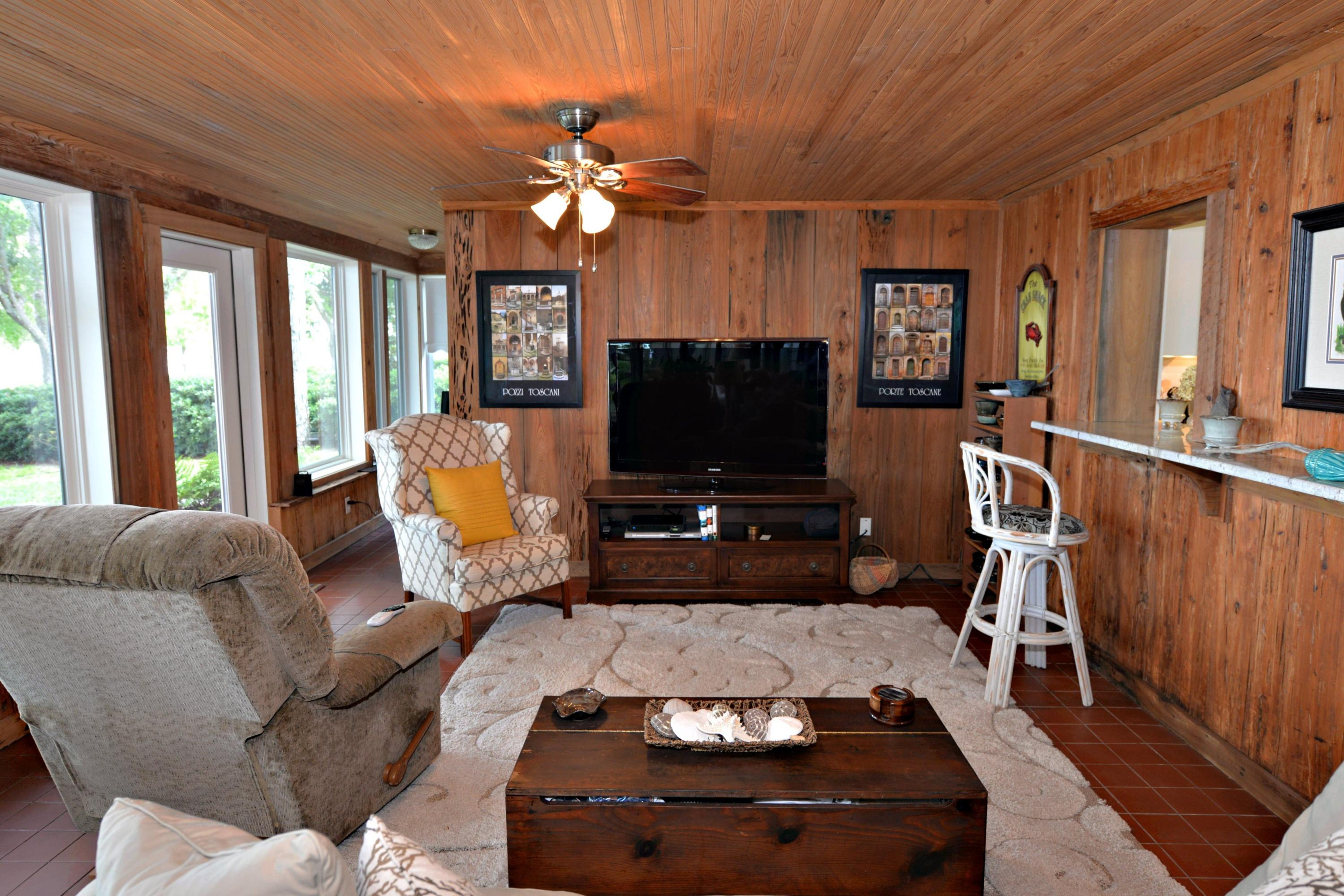 2394 Bay Grove Road Freeport, FL 32439 - Photo 10 of 37 a living room with furniture and a flat screen tv
