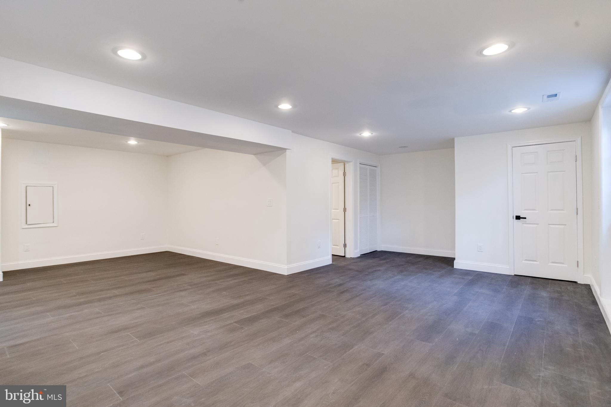8041 Edgewater Avenue Rosedale, MD 21237 - Photo 24 of 38 a view of an empty room with wooden floor and closet
