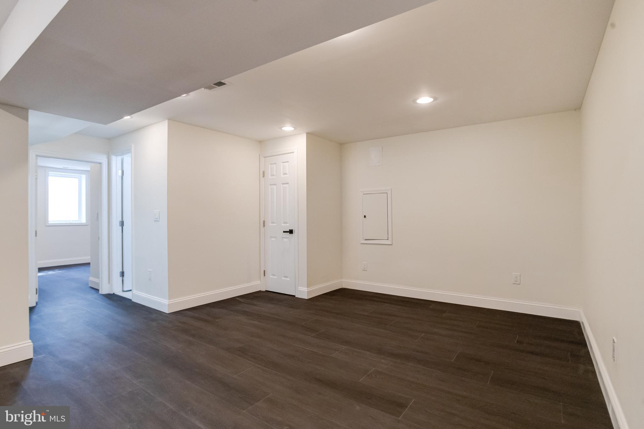 8041 Edgewater Avenue Rosedale, MD 21237 - Photo 26 of 38 a view of wooden floor in an empty room with a window